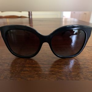 Coach black sunglasses with original hard case. Never worn!